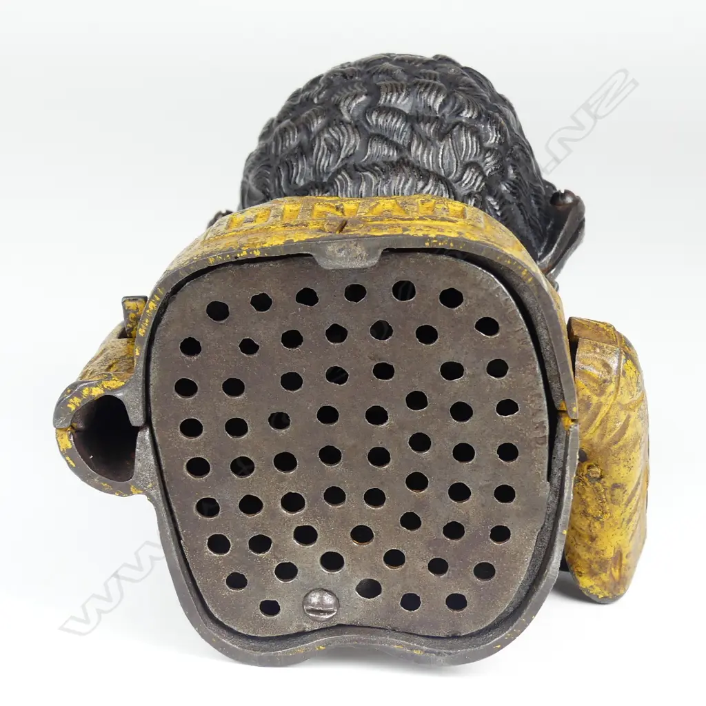 A vintage Dinah cast iron money bank Image 1++