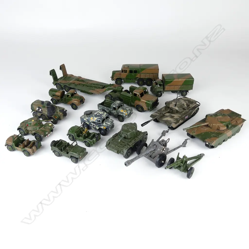 A collection of 16 vintage Dinky die-cast military vehicles Image 1++