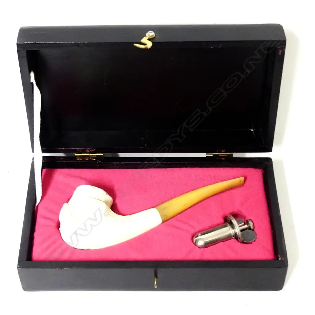 A meerschaum bowled pipe with amber stem Image 1++
