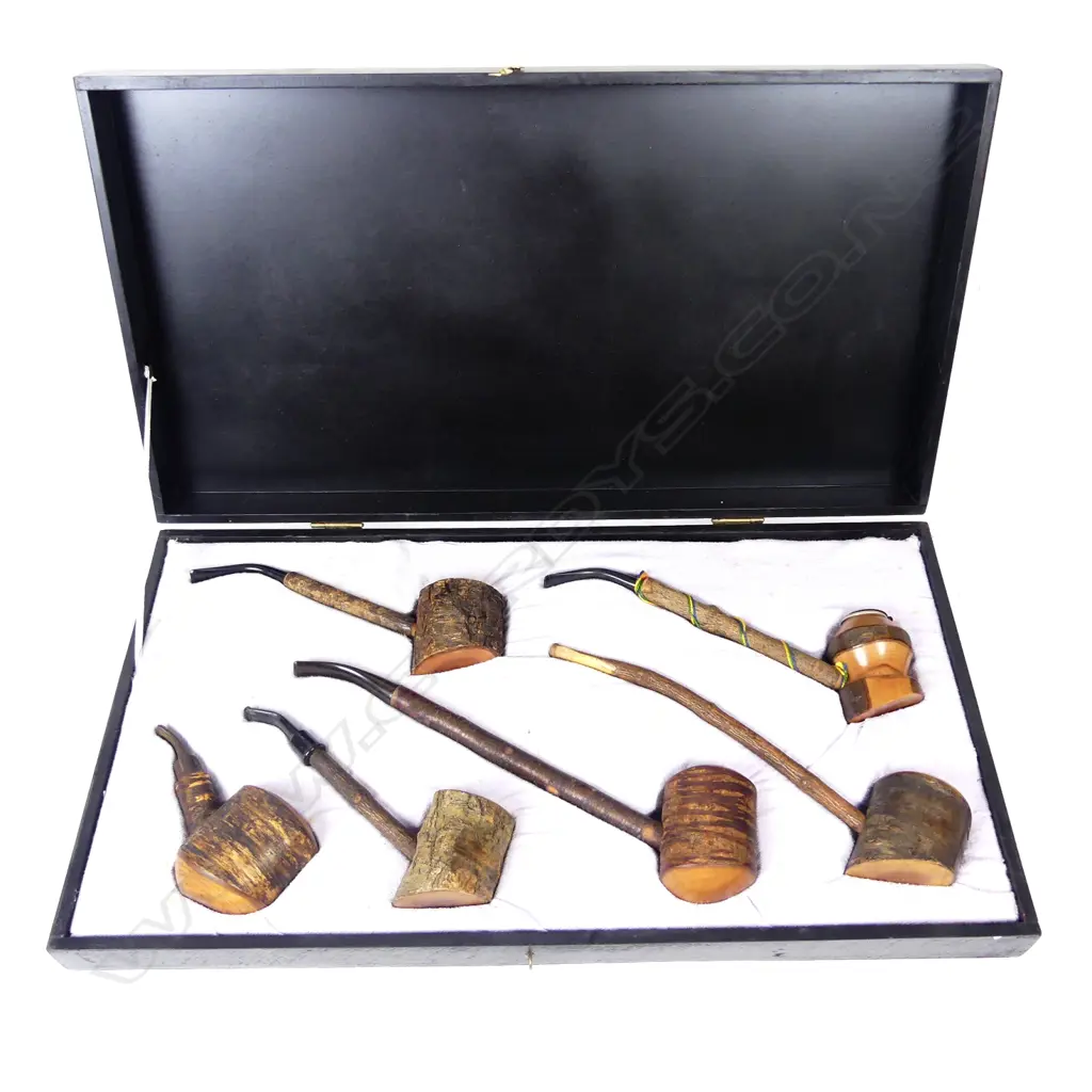 A collection of six pipes Image 1++