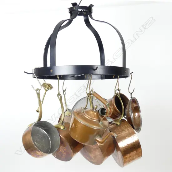 A wrought iron kitchen pot hanger