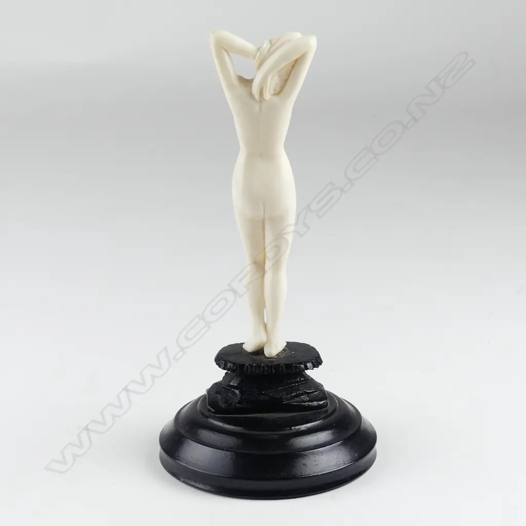 An ivory carved figure Image 1++