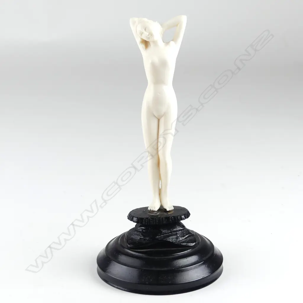An ivory carved figure Image 1++