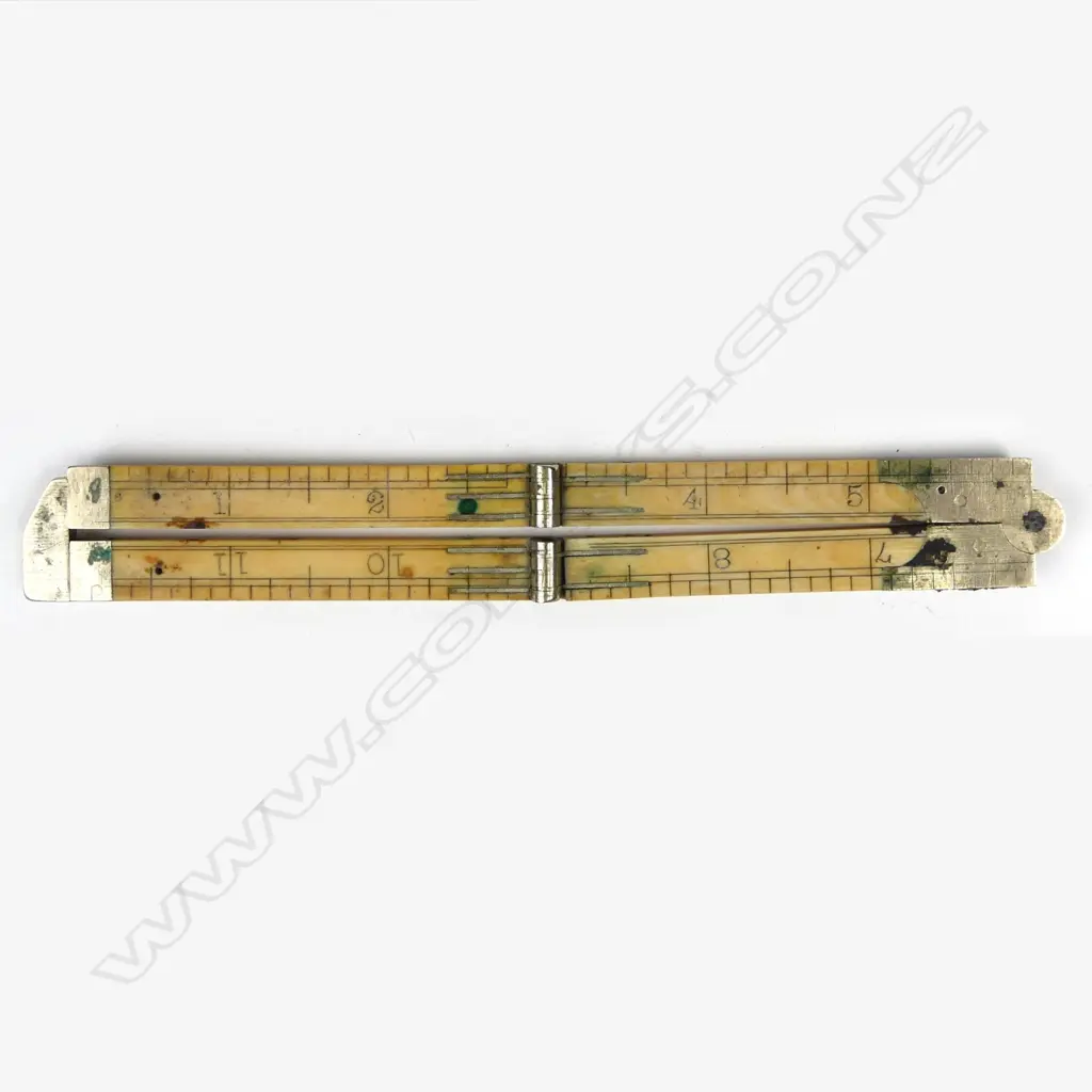 An early 20thC Rabone ivory and white metal four-fold 12” rule Image 1++