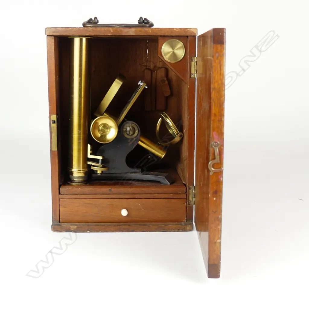 A Victorian brass microscope Image 1++