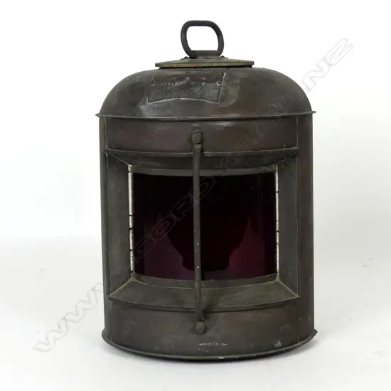 A vintage copper port light