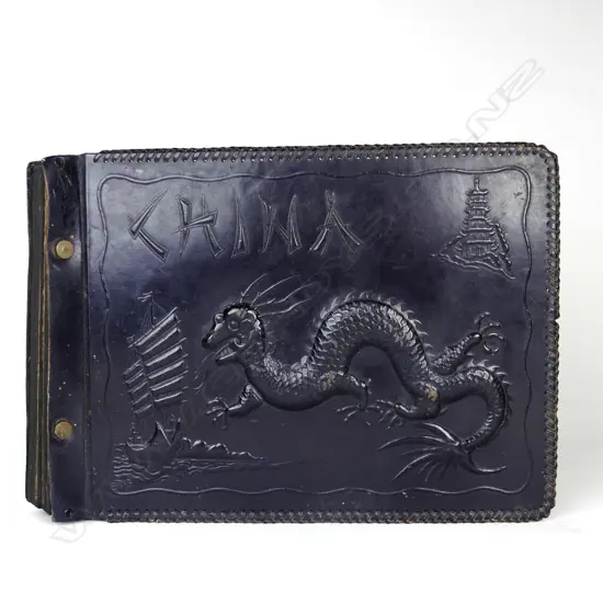 A vintage Chinese leather photo album