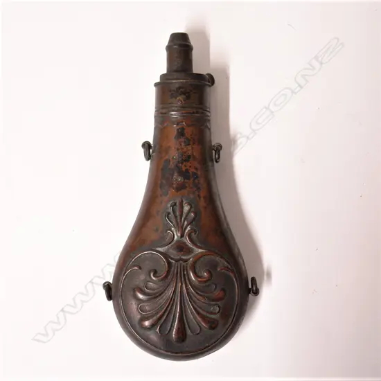 A 19thC copper embossed powder flask