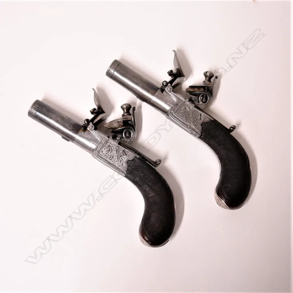 A pair of late 1700s pocket flintlock pistols by J.N. Jones & Son of London Image 1++