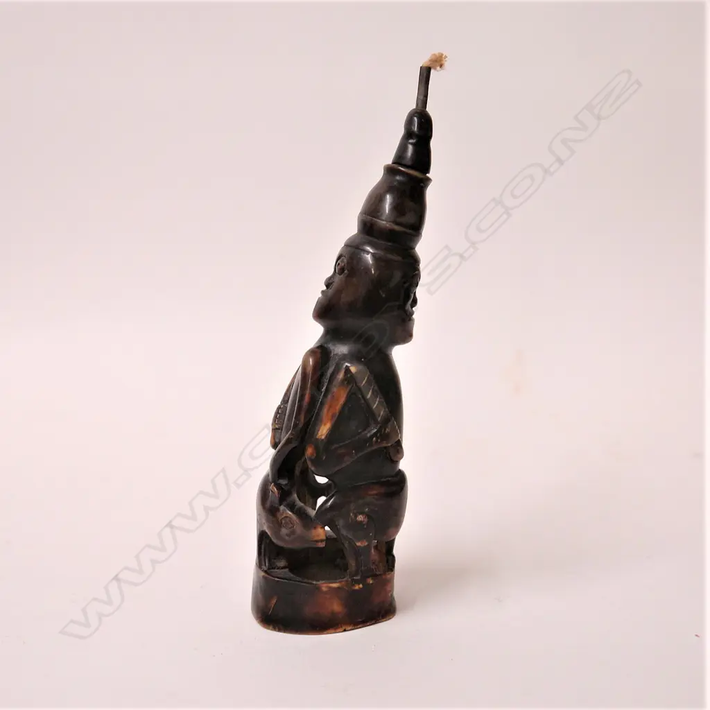 A tribal carved horn lamp Image 1++