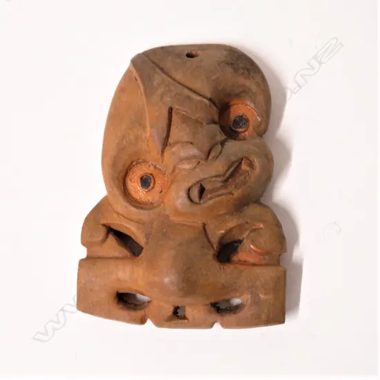 An early/mid 20thC carved wooden tiki