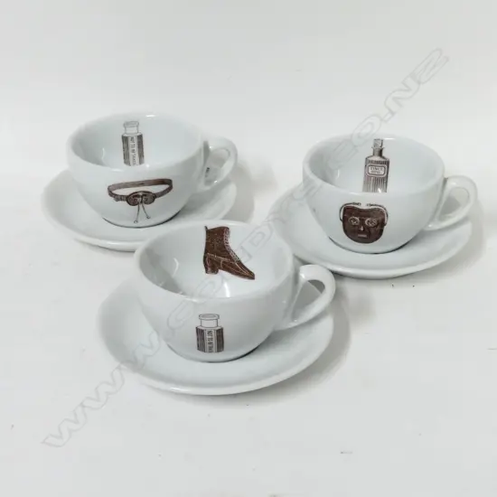 Three coffee cups and saucers
