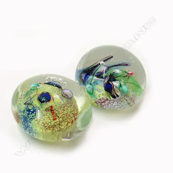 Two Peter Viesnik coloured glass paperweights