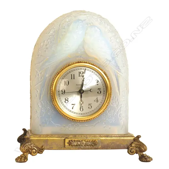 A 1930s opalescent glass cased clock