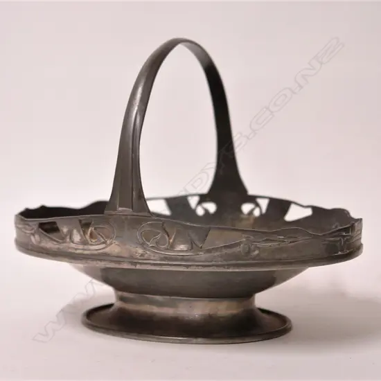 An English Pewter Archibald Knox design footed basket