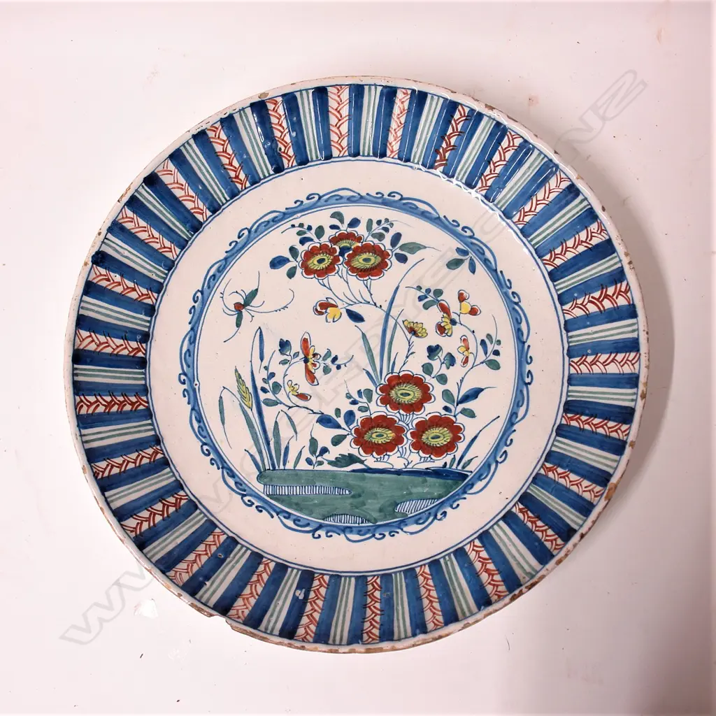 A late 18thC quality Dutch Delft polychrome enamel tin glaze plate Image 1++