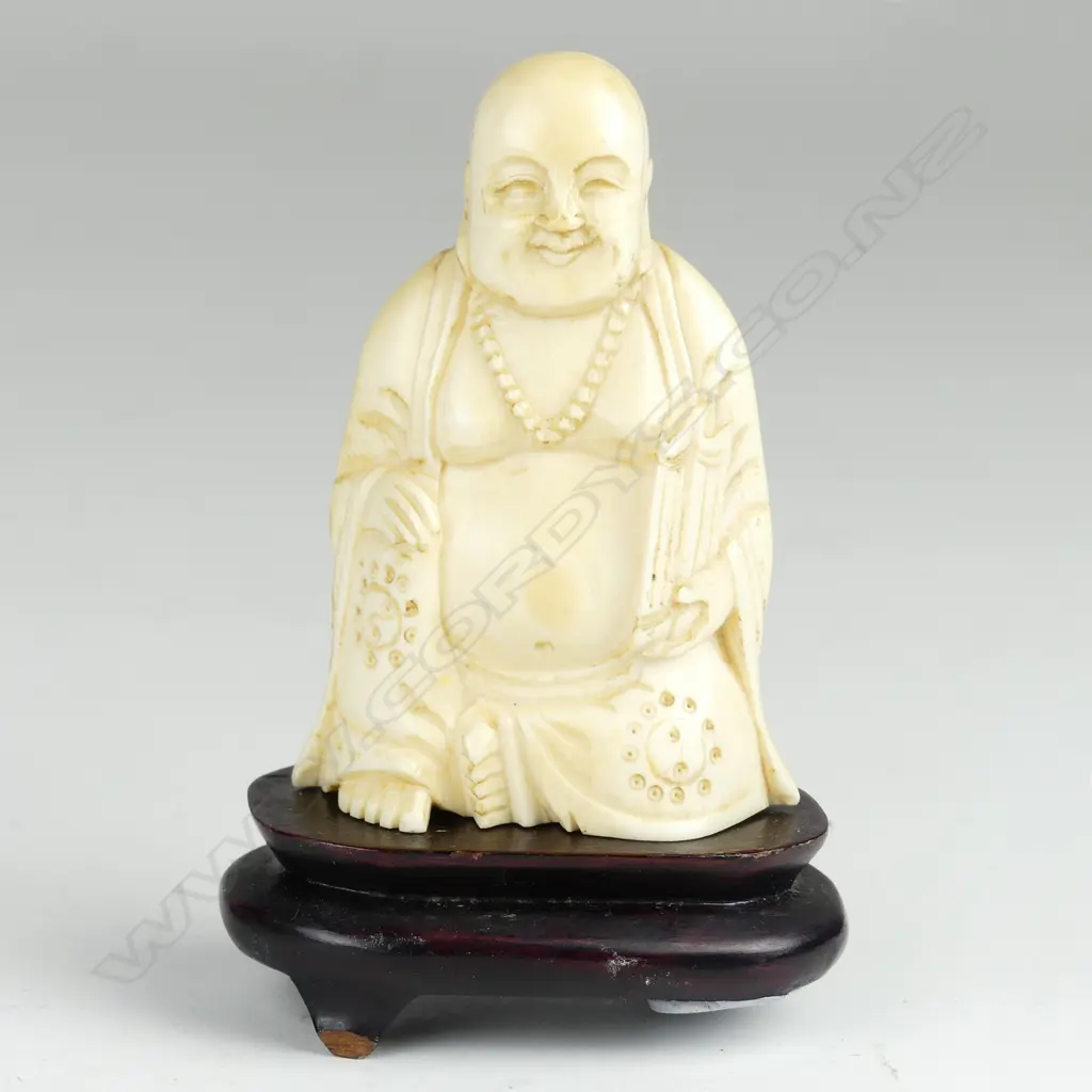 A Chinese carved ivory Buddha Image 1++