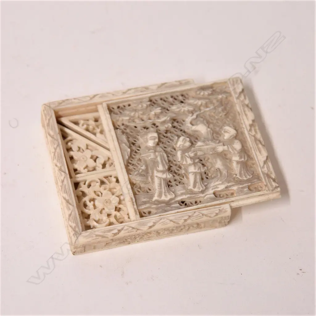 A 19thC Chinese finely carved ivory tangram puzzle Image 1++