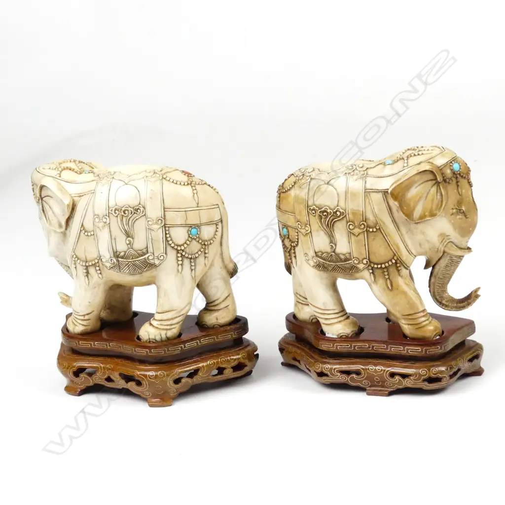 A pair of Chinese carved ivory elephants Image 1++