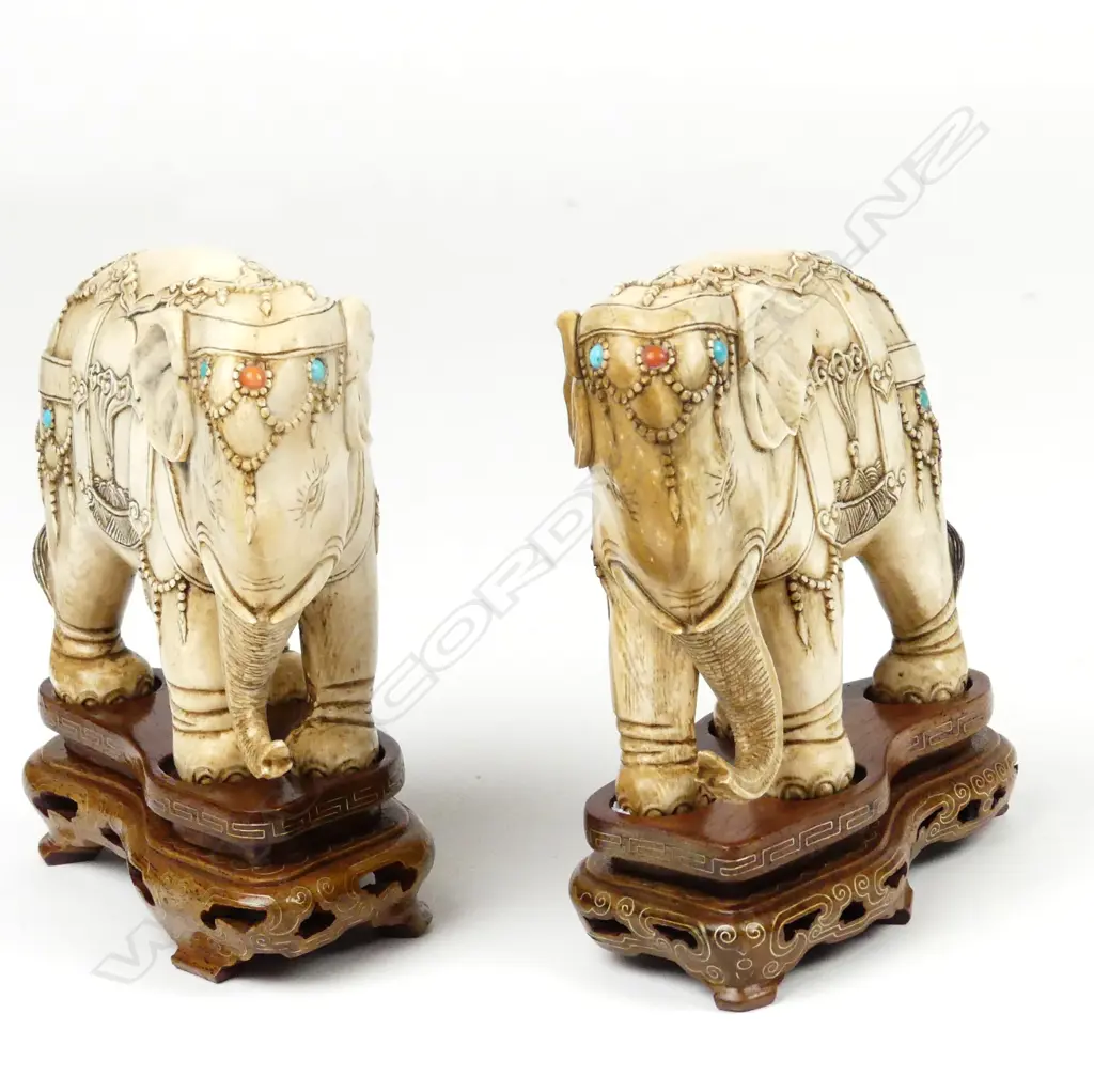 A pair of Chinese carved ivory elephants Image 1++