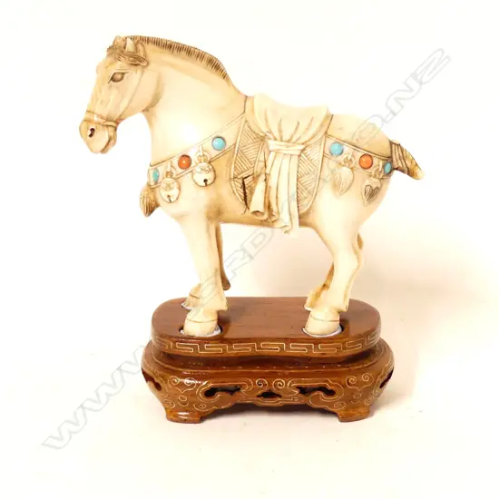 A Chinese carved ivory horse