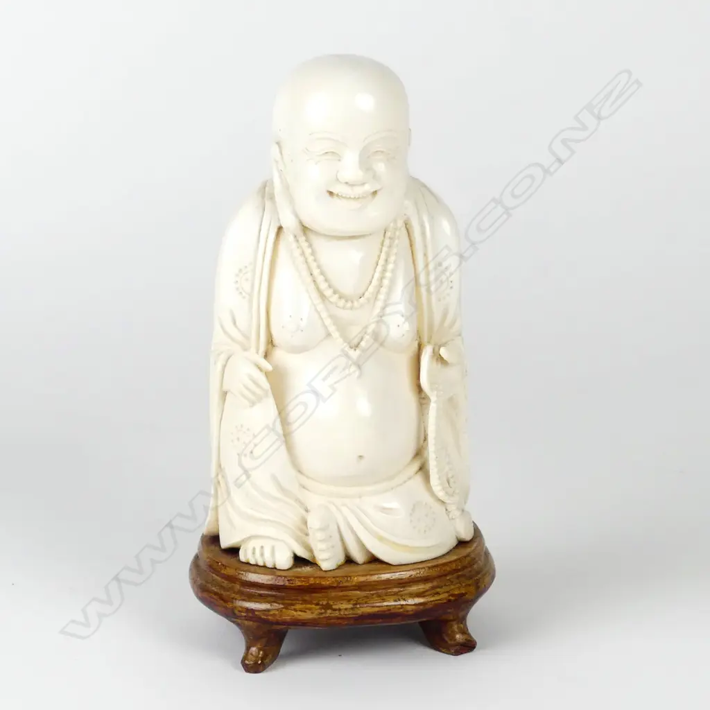 A vintage Oriental solid carved ivory figure of Hotei Image 1++
