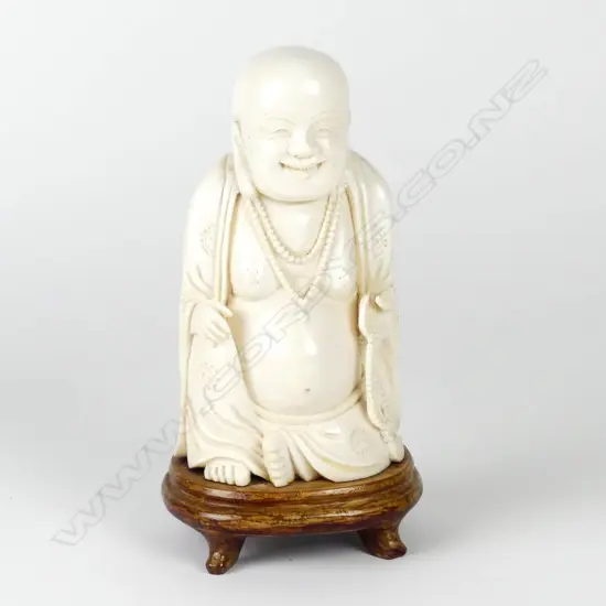 A vintage Oriental solid carved ivory figure of Hotei