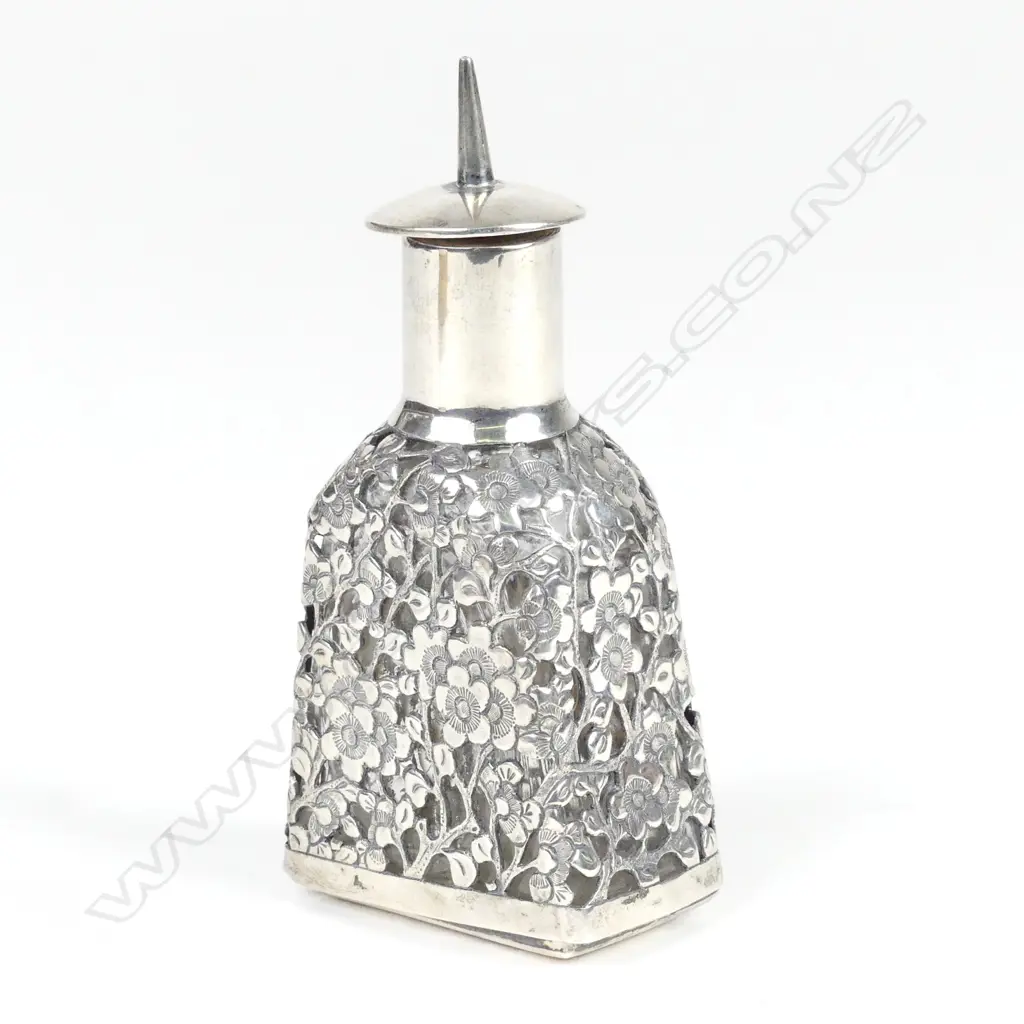 A c.1890 Chinese silver Wang Hing covered glass perfume bottle Image 1++