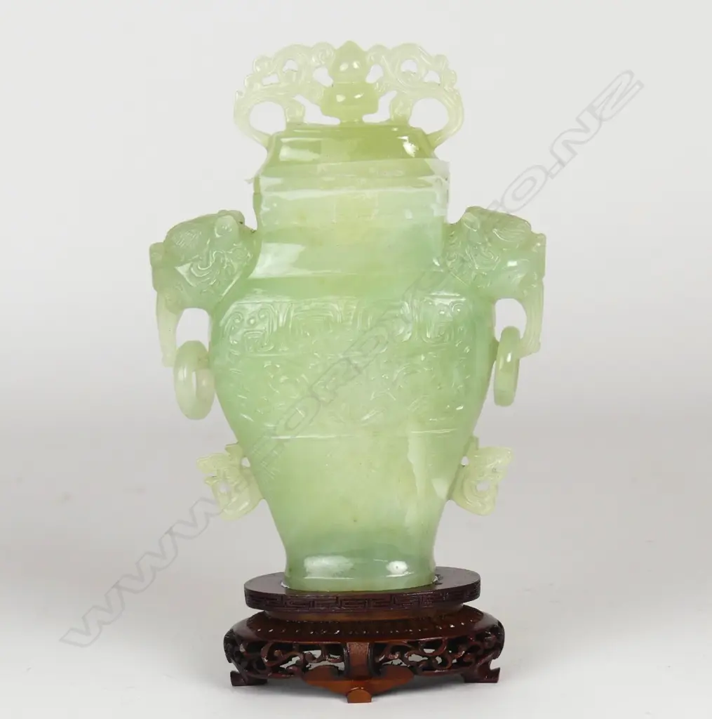 A Chinese pale jade vase and cover Image 1++