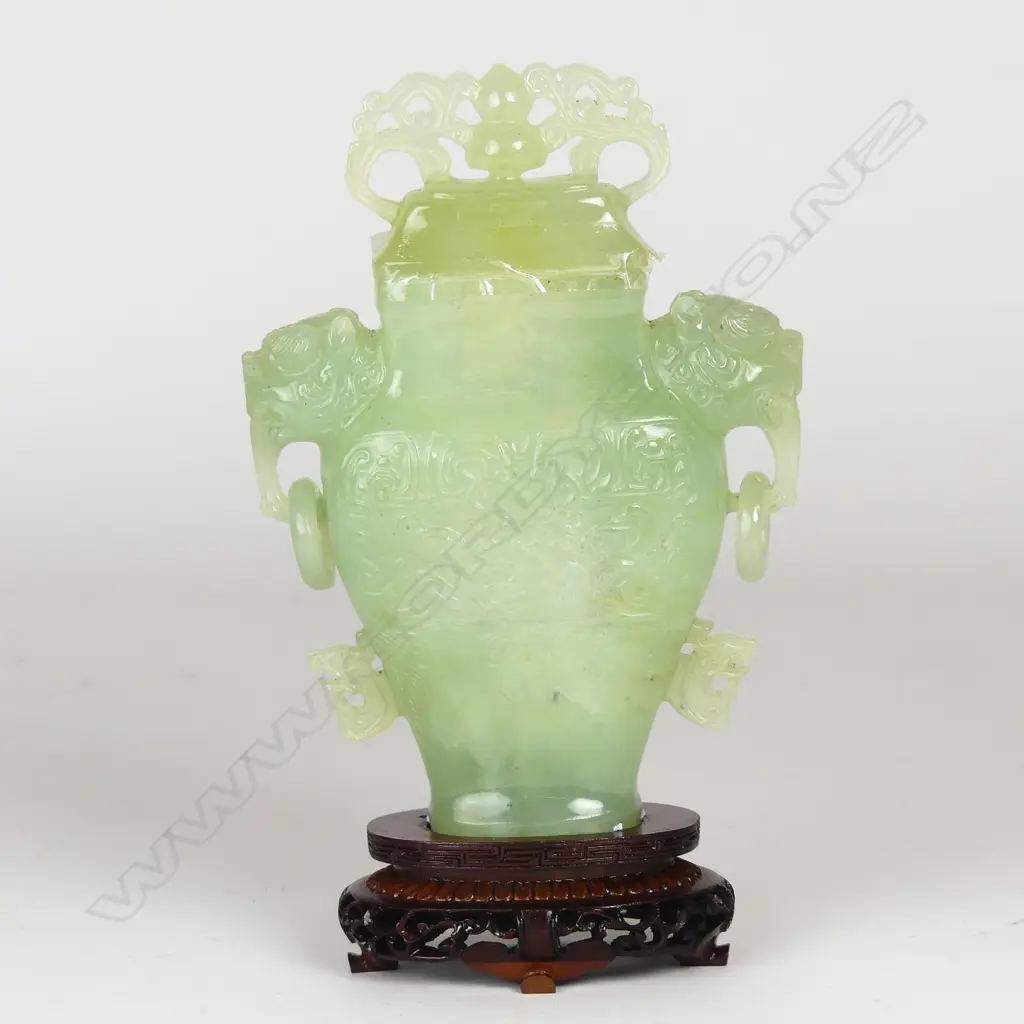 A Chinese pale jade vase and cover Image 1++