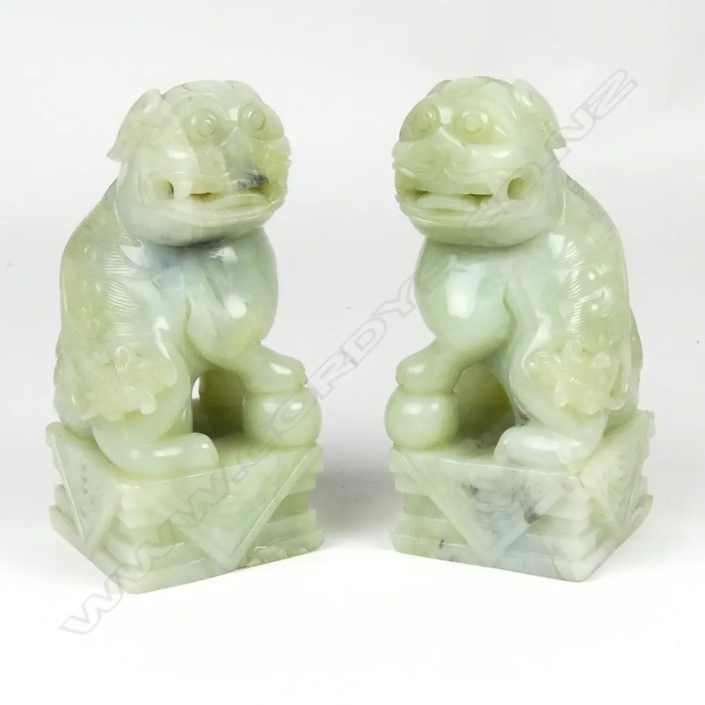 A pair of large Chinese pale jade foo dogs Image 1++