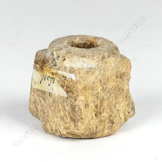 A Chinese carved stone cong