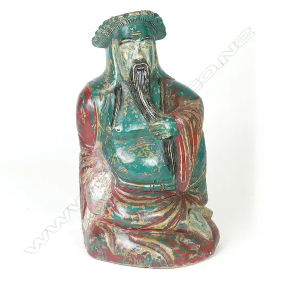 A carved Chinese wooden figure