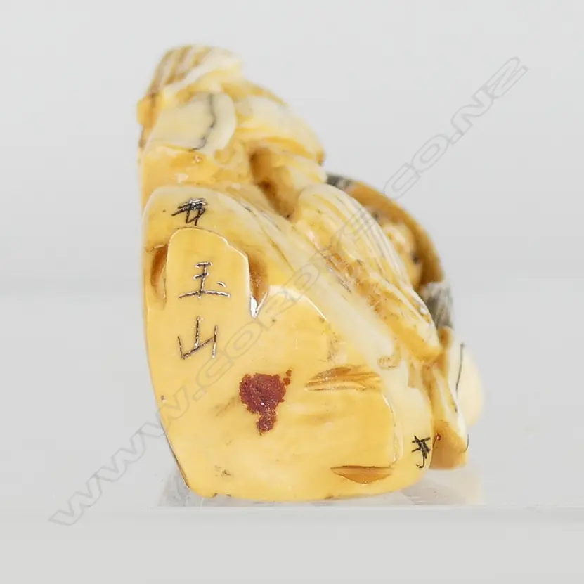 A Japanese netsuke of a demon Image 1++