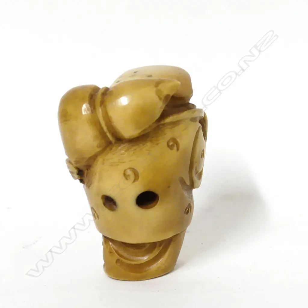 A tagua nut carved netsuke Image 1++