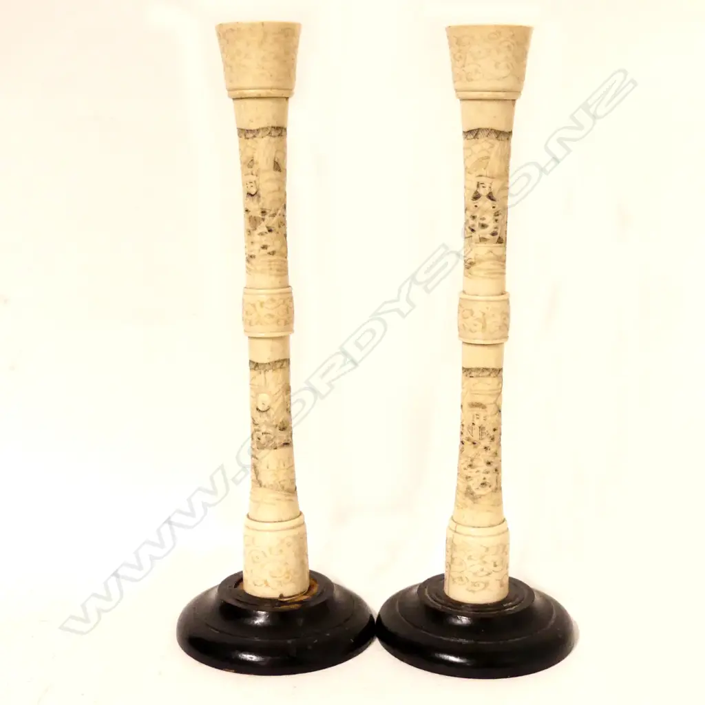 A pair of Japanese carved bone candlesticks Image 1++