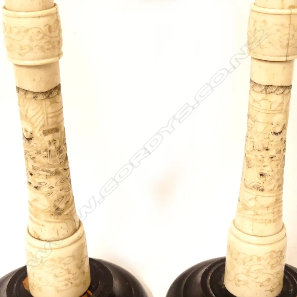 A pair of Japanese carved bone candlesticks Image 1++