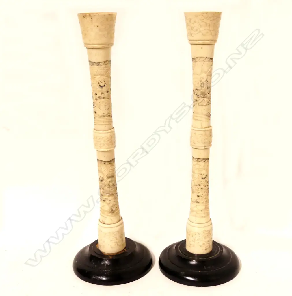 A pair of Japanese carved bone candlesticks Image 1++