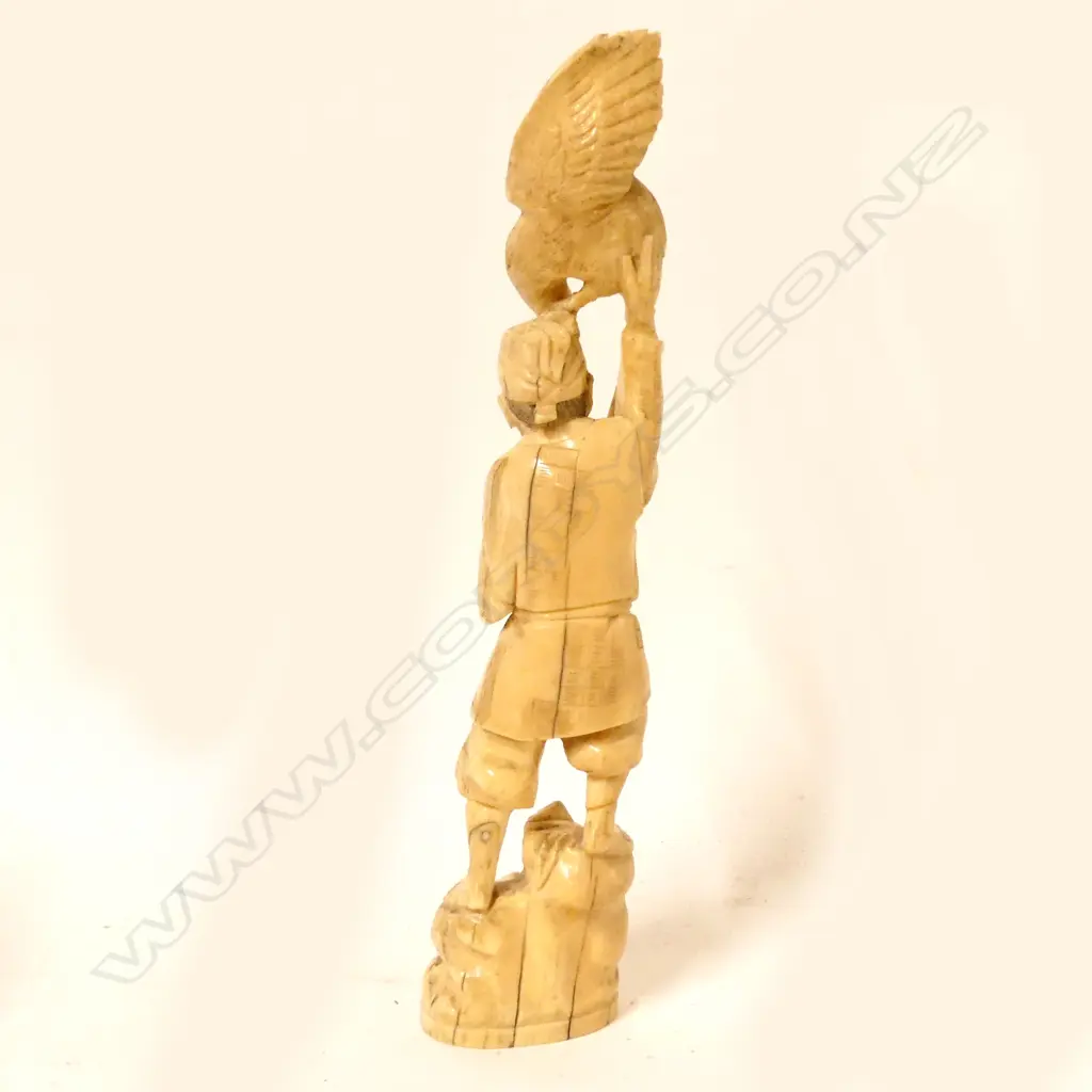 A Japanese carved marine ivory figure Image 1++