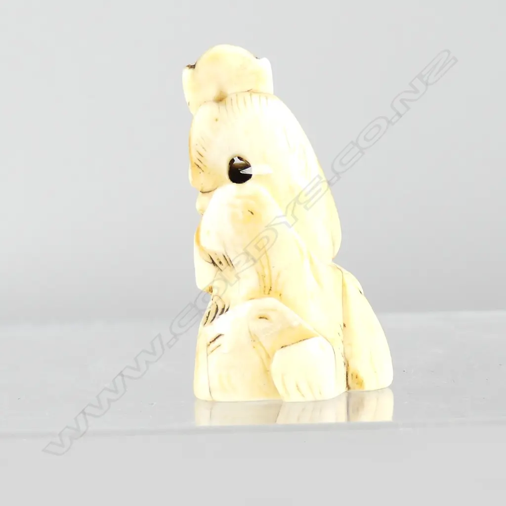 A Japanese ivory netsuke of a monkey Image 1++