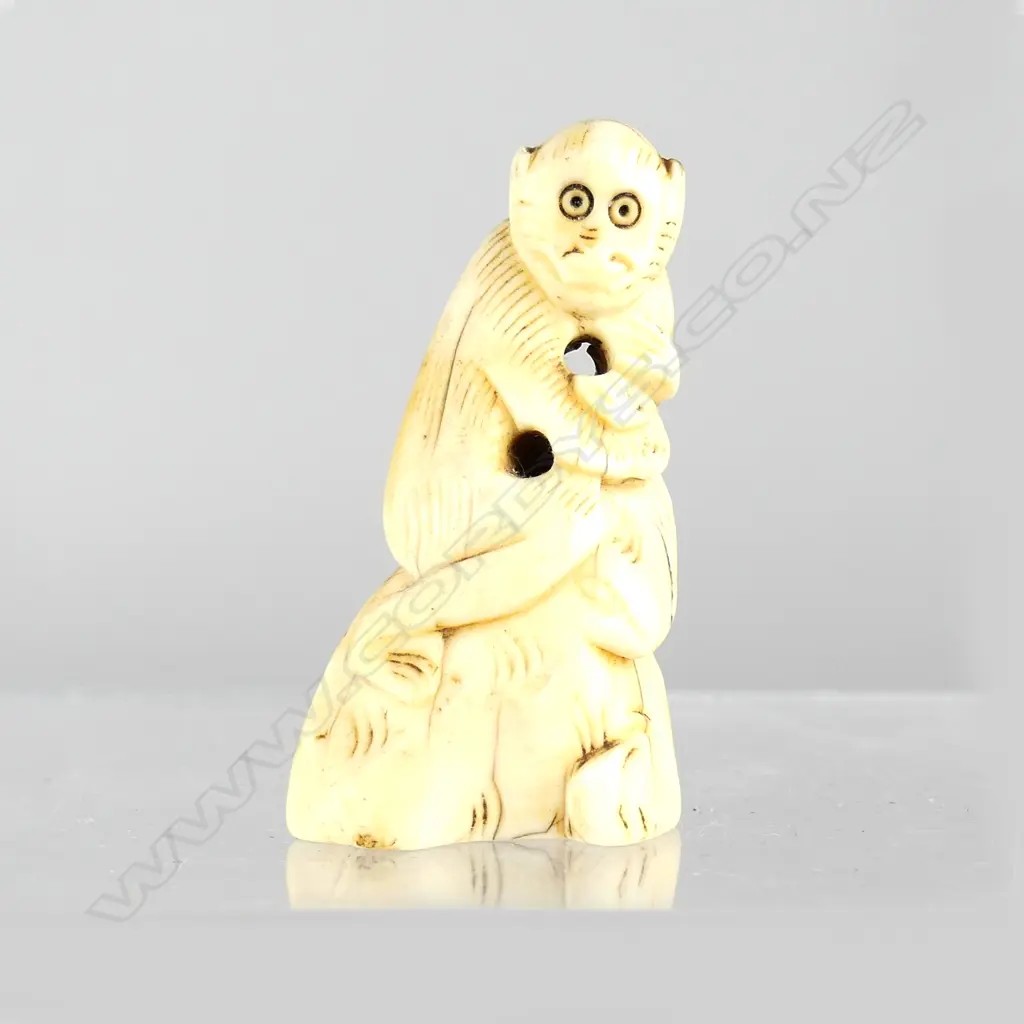 A Japanese ivory netsuke of a monkey Image 1++