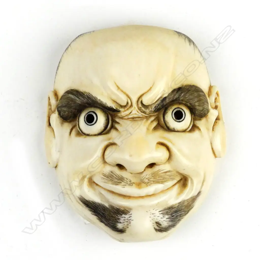 A diminutive Japanese ivory mask Image 1++