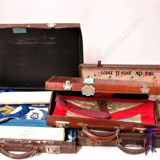 Three Masonic leather cases including elaborate sashes