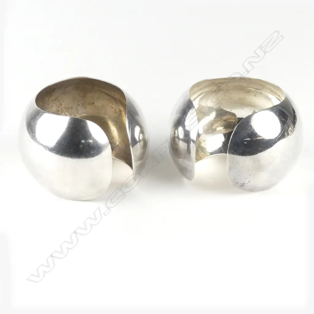 A pair of vintage Mexican silver wide domed cuff bangles Image 1++