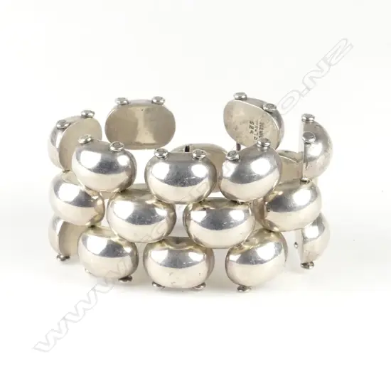 A substantial vintage Mexican silver dome linked bracelet