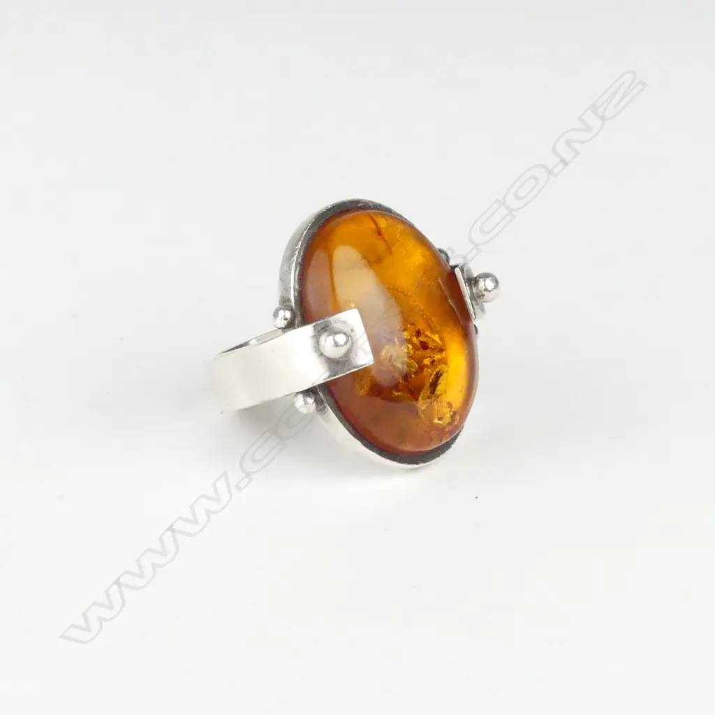 A modernist silver and amber cabochon designer ring Image 1++