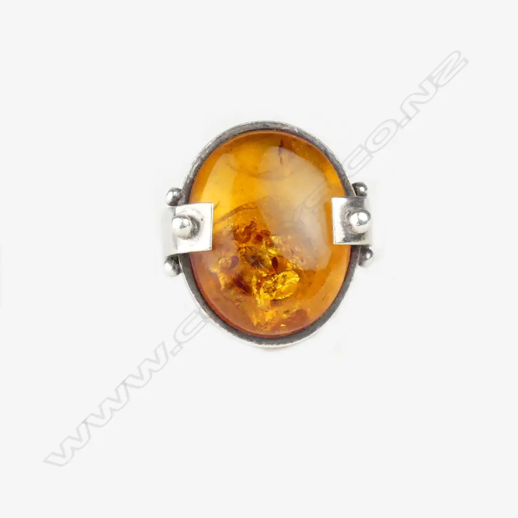 A modernist silver and amber cabochon designer ring Image 1++