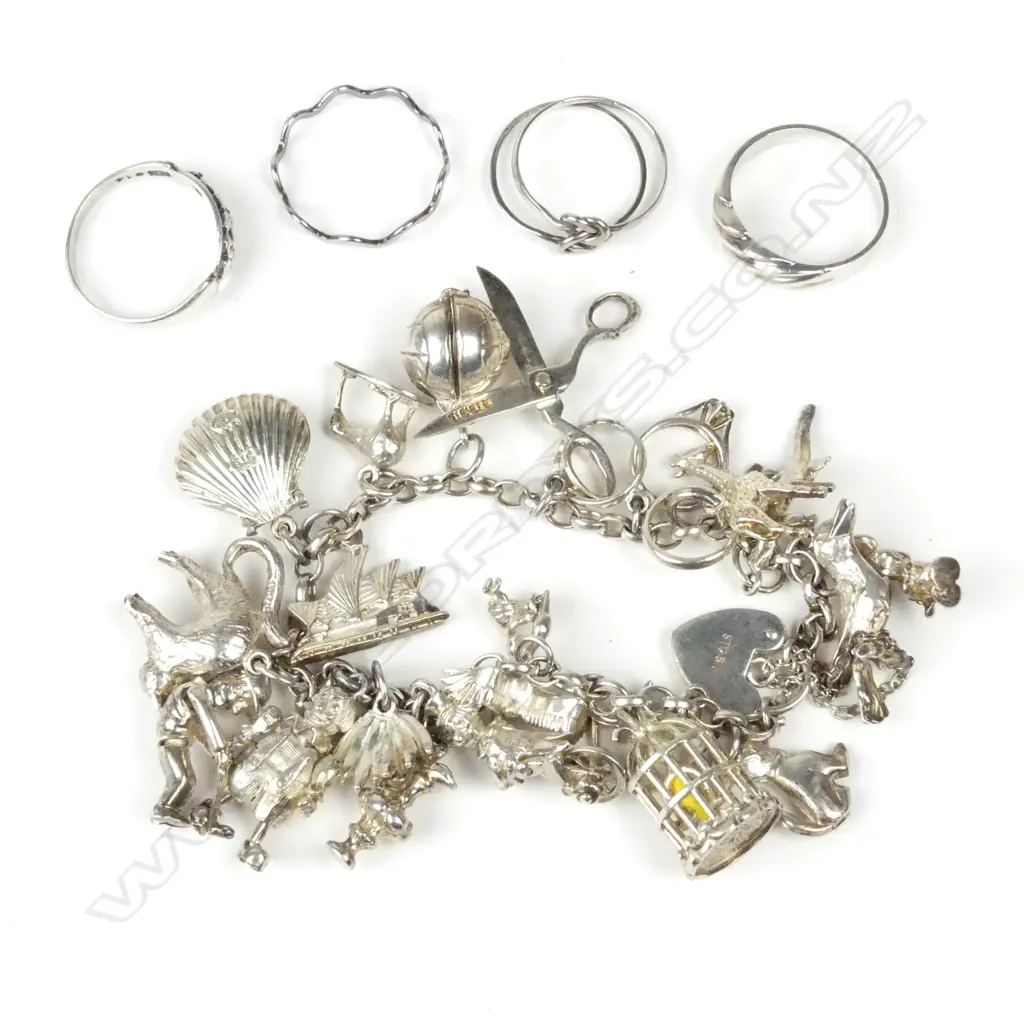 A silver charm bracelet Image 1++