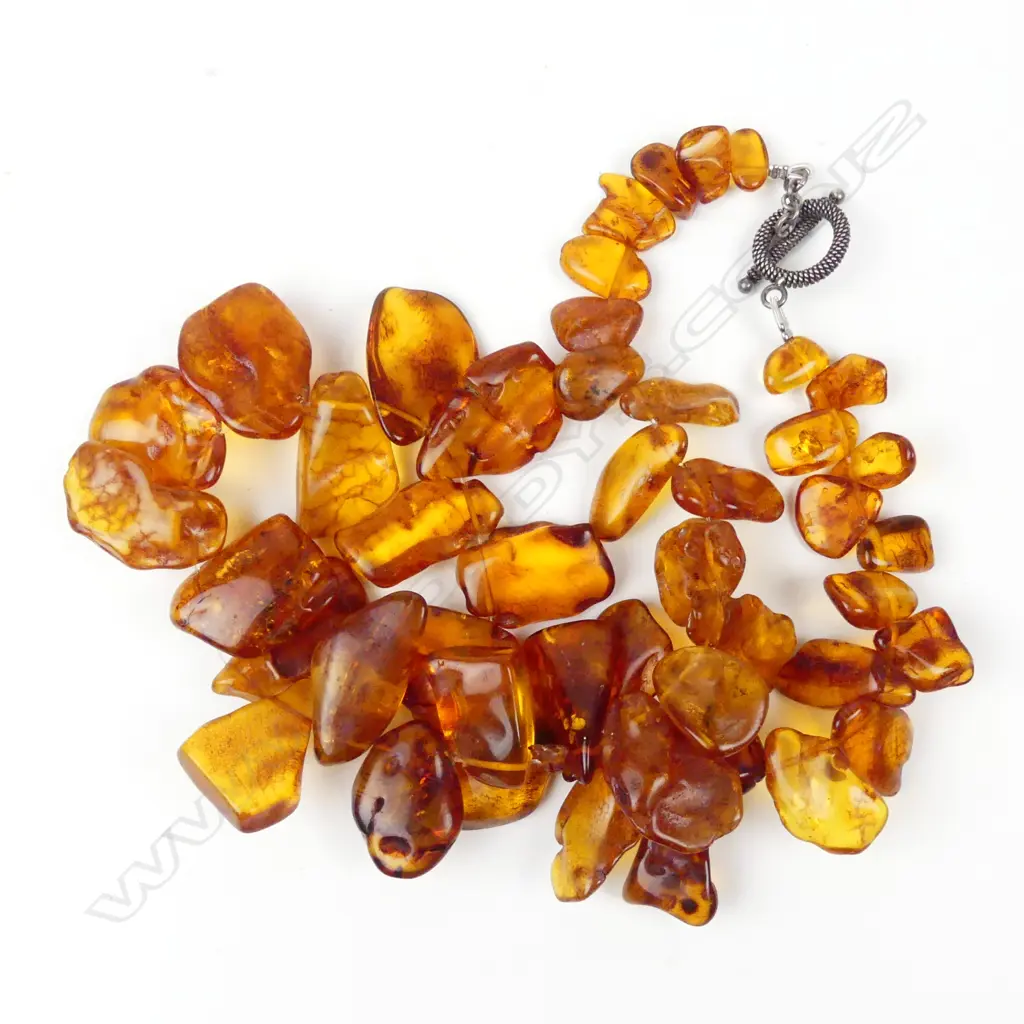 A Baltic amber graduated nugget bead necklace Image 1++
