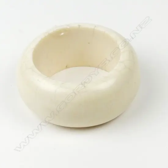 A vintage substantial plain carved ivory bangle